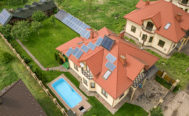 solar collectors on ground and roof