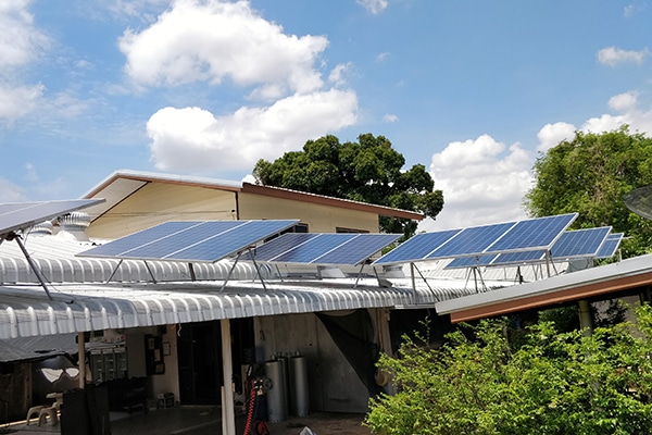 multiple solar panels mounted on a roof